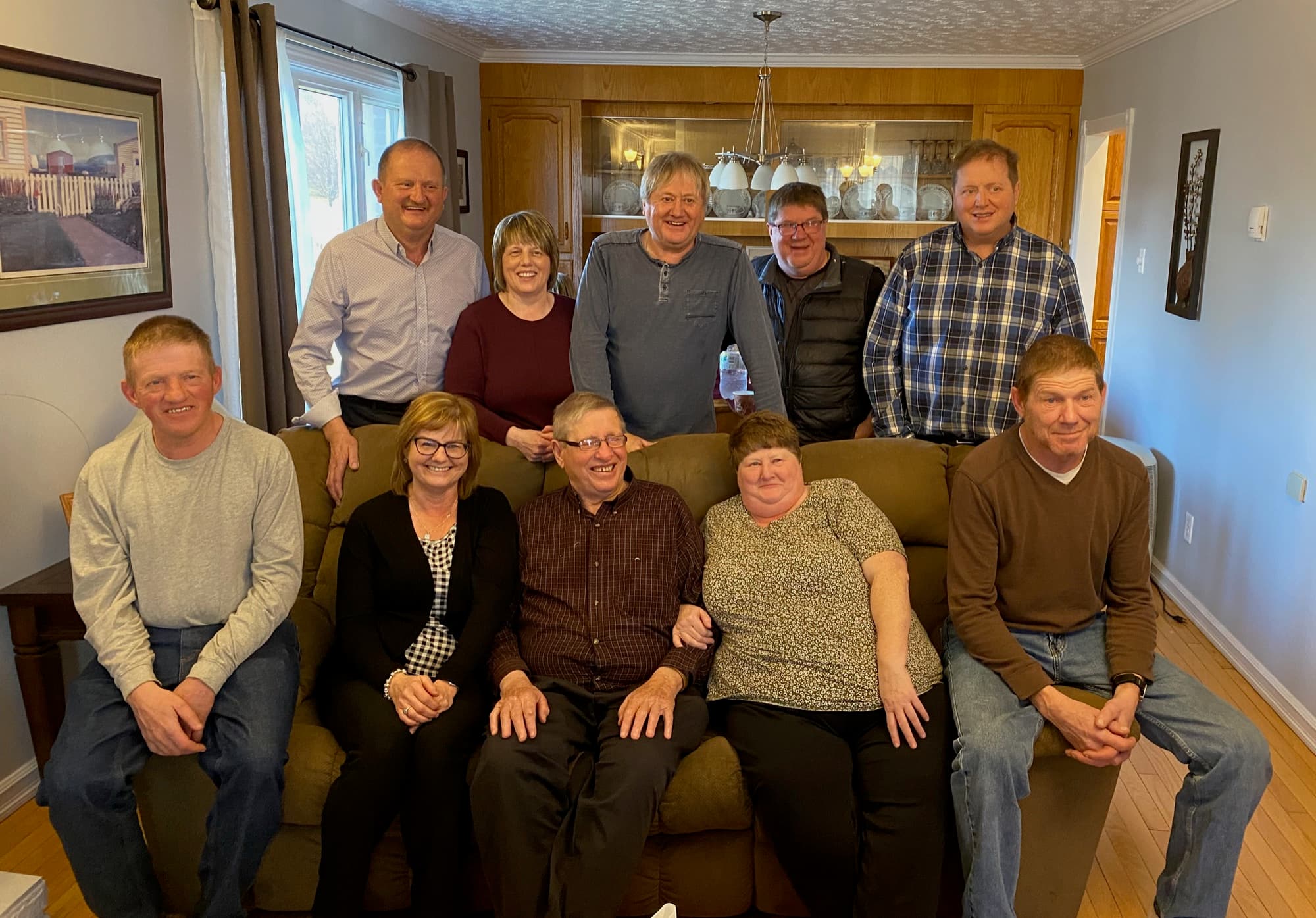 The Burden family — all nine children working together at Burden's General Store